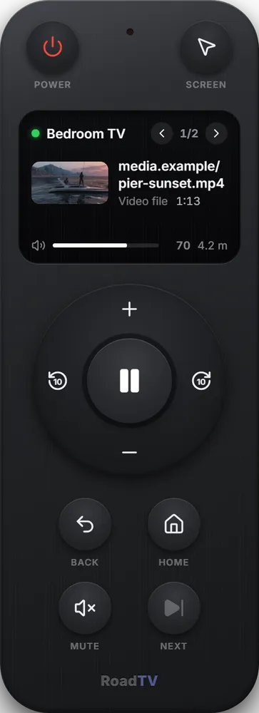 The RoadTV remote with the playing video, a control ring and buttons for back, home, mute and next