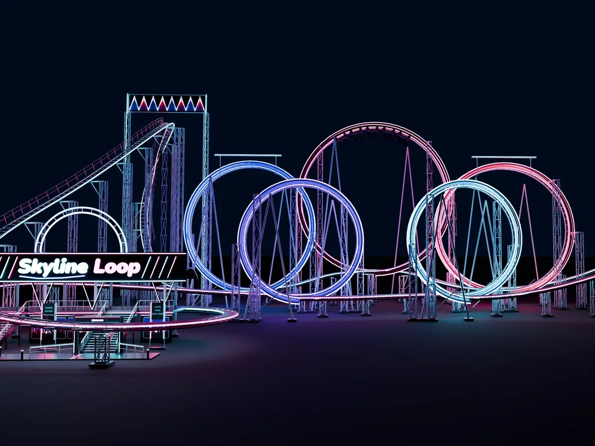 The SkylineLoop coaster at night, with its station and five lit loops